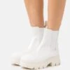 Calvin Klein Jeans Chunky Combat Chelsea Boot - Platform Ankle Boots - White -Fashion Shop 8e2fbb1e79404c3eab4415b6fa90fadd